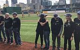 People with connections to the victims of the Pittsburgh synagogue and Parkland school shootings were honored at PNC Park in Pittsburgh before a game, April 6, 2019. (Mike Elk)