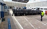 Illustrative. Prison guards during anti-riot training at Ketziot Prison, April 2019. (Israel Prisons Authority)