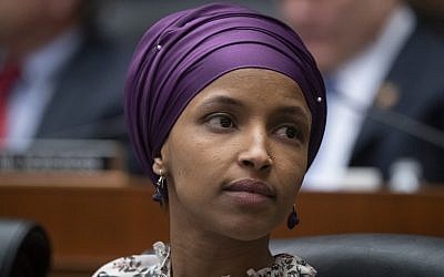In this March 6, 2019, file photo, US Rep. Ilhan Omar sits with fellow Democrats on the House Education and Labor Committee during a bill markup, on Capitol Hill in Washington. (AP Photo/J. Scott Applewhite, File)
