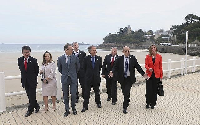 Japanese Foreign Minister Taro Kono, Canada's Foreign Minister Chrystia Freeland, Germany's Foreign Minister Heiko Maas, Britain's Director General for Political Affairs at the Foreign & Commonwealth Office Richard Moore, Italy's Foreign Minister Enzo Moavero Milanesi, US Deputy Secretary of State John J. Sullivan, French Foreign Minister Jean-Yves Le Drian and European Union High Representative for Foreign Affairs and Security Policy Federica Mogherini, from left to right, walk for a group photo on the second day of a G7 meeting at ministerial level in Dinard, Brittany, April 6, 2019. (AP Photo/David Vincent) Japanese Foreign Minister Taro Kono, Canada's Foreign Minister Chrystia Freeland, Germany's Foreign Minister Heiko Maas, Britain's Director General for Political Affairs at the Foreign & Commonwealth Office Richard Moore, Italy's Foreign Minister Enzo Moavero Milanesi, US Deputy Secretary of State John J. Sullivan, French Foreign Minister Jean-Yves Le Drian and European Union High Representative for Foreign Affairs and Security Policy Federica Mogherini, from left to right, walk for a group photo on the second day of a G7 meeting at ministerial level in Dinard, Brittany, April 6, 2019. (AP Photo/David Vincent)
