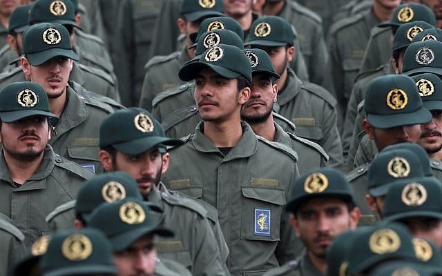 In this Feb. 11, 2019 file photo, Iranian Revolutionary Guard members attend a ceremony celebrating the 40th anniversary of the Islamic Revolution, at the Azadi, or Freedom, Square in Tehran, Iran. (AP Photo/Vahid Salemi) In this Feb. 11, 2019 file photo, Iranian Revolutionary Guard members attend a ceremony celebrating the 40th anniversary of the Islamic Revolution, at the Azadi, or Freedom, Square in Tehran, Iran. (AP Photo/Vahid Salemi)