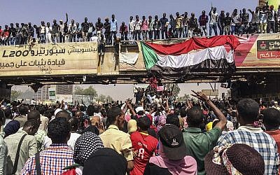 Protesters rally near the military headquarters, April 9, 2019, in the capital Khartoum, Sudan. (AP Photo)