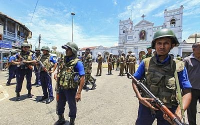 Sri Lankan Army soldiers secure the area around St. Anthony Shrine after a blast in Colombo, Sri Lanka, Sunday, April 21, 2019 (AP Photo/Chamila Karunarathne)