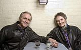 In this April 8, 2004 file photo, playwright Mark Medoff, left, and actress Phyllis Frelich pose for a photo in New York. Medoff, who wrote the award-winning play "Children of a Lesser God," has died in New Mexico at age 79. Medoff's daughter, Jessica Bunchman, confirmed that he died Tuesday, April 23, 2019, in a Las Cruces hospice, surrounded by family. Frelich won a Tony in 1980 for her Broadway portrayal of Sarah Norman, the deaf woman at the heart of the play. (AP Photo/Justin Walters)