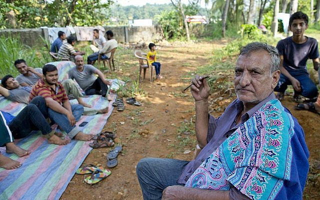 Ahmadi Muslim refugees at a community center where they took refuge in Pasyala, northeast of Colombo, Sri Lanka, on April 25, 2019. (AP/Gemunu Amarasinghe) Ahmadi Muslim refugees at a community center where they took refuge in Pasyala, northeast of Colombo, Sri Lanka, on April 25, 2019. (AP/Gemunu Amarasinghe)