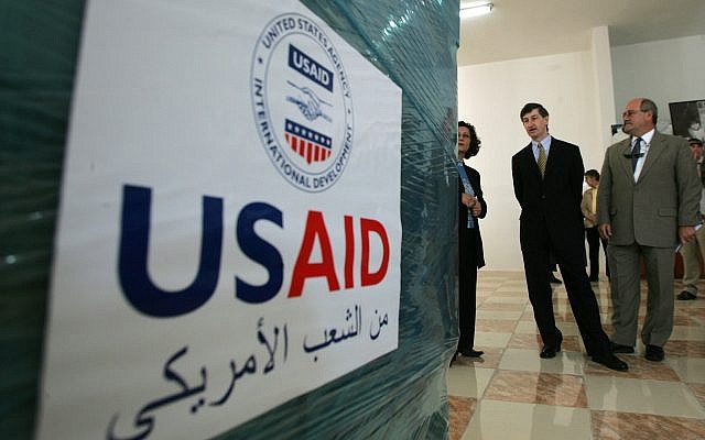 US consul general in Jerusalem Jacob Walles (2nd R) looks at USAID donations donated to the Palestinians in the West Bank town of Ramallah on May 10, 2006. (AP Photo/Muhammed Muheisen) US consul general in Jerusalem Jacob Walles (2nd R) looks at USAID donations donated to the Palestinians in the West Bank town of Ramallah on May 10, 2006. (AP Photo/Muhammed Muheisen)