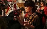 Orthodox Christian worshippers hold candles during the Easter Eve service at the St. Porphyrios church in Gaza City, Saturday, April 15, 2017. (AP Photo/Adel Hana)