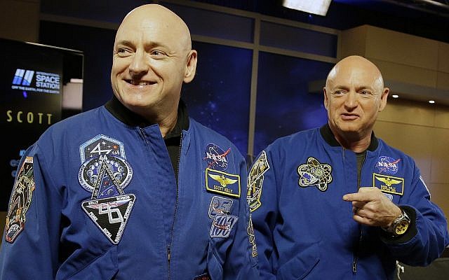 FILE - In this March 4, 2016 file photo, NASA astronaut Scott Kelly, left, and his identical twin, Mark, stand together before a news conference in Houston (AP Photo/Pat Sullivan, File) FILE - In this March 4, 2016 file photo, NASA astronaut Scott Kelly, left, and his identical twin, Mark, stand together before a news conference in Houston (AP Photo/Pat Sullivan, File)