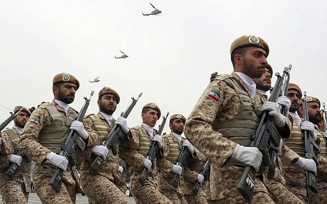 In this photo released by the official website of the office of the Iranian Presidency, troops march in a military parade marking National Army Day in front of the shrine of the late revolutionary founder Ayatollah Ruhollah Khomeini, just outside Tehran, Iran on April 18, 2019. (Iranian Presidency Office via AP) In this photo released by the official website of the office of the Iranian Presidency, troops march in a military parade marking National Army Day in front of the shrine of the late revolutionary founder Ayatollah Ruhollah Khomeini, just outside Tehran, Iran on April 18, 2019. (Iranian Presidency Office via AP)