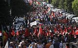 People take part in a Liberation Day march in Rome, Italy, Thursday, April 25, 2019. (AP/Alessandra Tarantino)