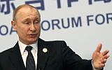 Russian President Vladimir Putin gestures while speaking the the media after the Belt and Road Forum in Beijing, China, April 27, 2019 (Sergei Ilnitsky/Pool Photo via AP)