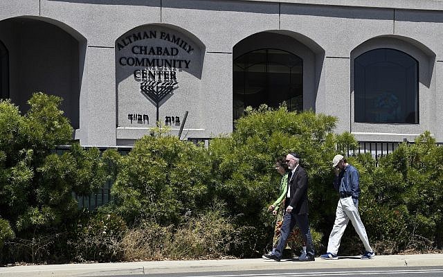 Synagogue members walk outside of the Chabad of Poway Synagogue, Saturday, April 27, 2019, in Poway, California (AP/Denis Poroy) Synagogue members walk outside of the Chabad of Poway Synagogue, Saturday, April 27, 2019, in Poway, California (AP/Denis Poroy)
