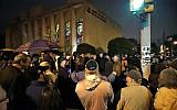 A group gathers outside the Tree of Life Synagogue in Pittsburgh, Pennsylvania, for a vigil to honor the victims of a shooting attack on another synagogue in Poway, California, on April 27, 2019. (AP/Gene J. Puskar)
