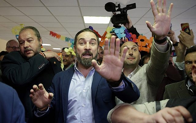 Santiago Abascal, center, leader of far right party Vox, gestures after casting his ballot at a polling station for Spain's general election in Madrid, Sunday, April 28, 2019. (AP Photo/Andrea Comas) Santiago Abascal, center, leader of far right party Vox, gestures after casting his ballot at a polling station for Spain's general election in Madrid, Sunday, April 28, 2019. (AP Photo/Andrea Comas)