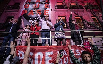 Spain's Prime Minister and Socialist Party leader Pedro Sanchez gestures to supporters outside the party headquarters following the general election in Madrid, Spain, Sunday, April 28, 2019. (AP Photo/Bernat Armangue)