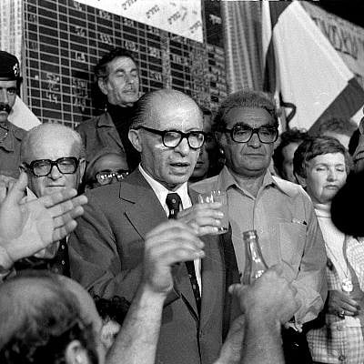 Menachem Begin, center, speaks to supporters at his party headquarters in Tel Aviv, on May 18, 1977, as they celebrate the Likud Bloc's election to government after 29 years of Israeli Labor Party rule. (AP Photo)