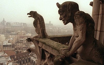 Gargoyles watch over the streets of Paris from the top of the 11th century Notre Dame cathedral, January 10, 1997. (AP/Remy de la Mauviniere)
