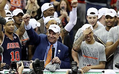 Illustrative: Head coach Bruce Pearl of the Auburn Tigers celebrates with his team after defeating the Kentucky Wildcats 77-71 in the 2019 NCAA Basketball Tournament Midwest Regional at Sprint Center on March 31, 2019 in Kansas City, Missouri. (Christian Petersen/Getty Images via JTA)