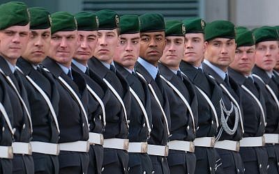 Soldiers of the Bundeswehr arrive for the state visit of a foreign leader at the Chancellery on March 13, 2019 in Berlin, Germany. (Sean Gallup/Getty Images via JTA)