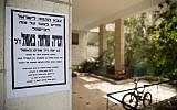 An death notice for Zachary Baumel outside his family home in Jerusalem, on April 4, 2019. (Yonatan Sindel/Flash90)
