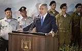 Prime Minister Benjamin Netanyahu speaks during the funeral of Zachary Baumel at the Mount Herzl military cemetery in Jerusalem on April 4, 2019. (Hadas Parush/Flash90)