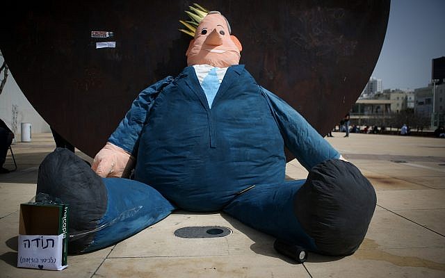 A giant doll in the form of Prime Minister Benjamin Netanyahu, placed at Habima Square in Tel Aviv on April 7, 2019. (Flash90) A giant doll in the form of Prime Minister Benjamin Netanyahu, placed at Habima Square in Tel Aviv on April 7, 2019. (Flash90)