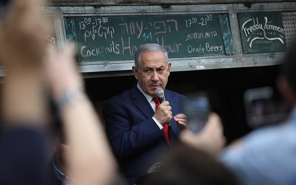 Prime Minister Benjamin Netanyahu seen during an election campaign tour in the Mahane Yehuda market in Jerusalem on April 8, 2019. (Hadas Parush/Flash90) Prime Minister Benjamin Netanyahu seen during an election campaign tour in the Mahane Yehuda market in Jerusalem on April 8, 2019. (Hadas Parush/Flash90)