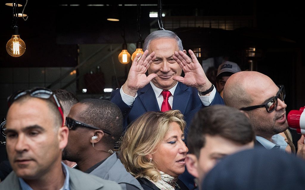 Prime Minister Benjamin Netanyahu seen during an election campaign visit to the Mahane Yehuda market in Jerusalem on April 8, 2019. (Yonatan Sindel/Flash90) Prime Minister Benjamin Netanyahu seen during an election campaign visit to the Mahane Yehuda market in Jerusalem on April 8, 2019. (Yonatan Sindel/Flash90)