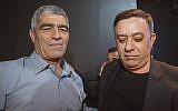 Labor party chairman Avi Gabbay (right) with party member Tal Russo as the results of the Knesset elections are announced at the party headquarters in Tel Aviv, on April 9, 2019. (Flash90)