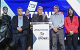 Labor party chairman Avi Gabbay (podium) flanked by Tal Russo (right) and former Labor leader Amir Peretz (left) addresses supporters and media as the results in the general elections are announced in Tel Aviv, on April 09, 2019 (FLASH90)