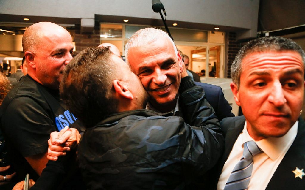 Head of the Kulanu party Moshe Kahlon speaks to party supporters at the party headquarters, on April 09, 2019. (Roy Alima/FLASH90)