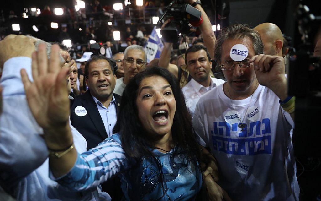 Likud supporters react to the first voting results in the Israeli general elections, at the Likud party headquarters in Tel Aviv, on April 9, 2019. (Yonatan Sindel/Flash90)