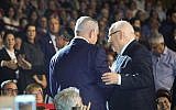 Prime Minister Benjamin Netanyahu (L) and President Reuven Rivlin attend a memorial event for fallen IDF soldiers in Jerusalem, April 14, 2019. (Noam Revkin Fenton/Flash90)