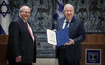 Central Elections Committee Chairman Hanan Melcer presents the official results of the April 9, 2019 Knesset elections to President Reuven Rivlin at the President's Residence in Jerusalem, April 17, 2019. (Hadas Parush/Flash90)