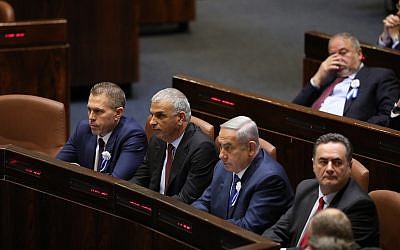 Left to right, front row: Public Security Minister Gilad Erdan, Finance Minister Moshe Kahlon, Prime Minister Benjamin Netanyahu, and Acting Foreign Minister Israel Katz in the Knesset's plenary hall during the swearing-in ceremony of Knesset members as a new session opens following the 2019 elections, on April 30, 2019. (Noam Revkin Fenton/Flash90)
