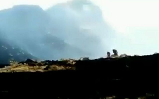 Baboons watch as smoke envelopes the Simien mountains in Ethiopia, in a video shared on April 11. (screen capture: Twitter/@ahackz) Baboons watch as smoke envelopes the Simien mountains in Ethiopia, in a video shared on April 11. (screen capture: Twitter/@ahackz)