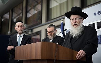 Deputy Health Minister Yaakov Litzman, right, of United Torah Judaism holds a press conference after meeting with President Reuven Rivlin, April 15, 2019. (Yonatan Sindel/Flash90)