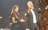 Ozcan Deniz (R) and Alsi Enver, stars of TV series Istanbullu Gelin, performing in Tel Aviv on April 6, 2019. (Screenshot: Twitter)