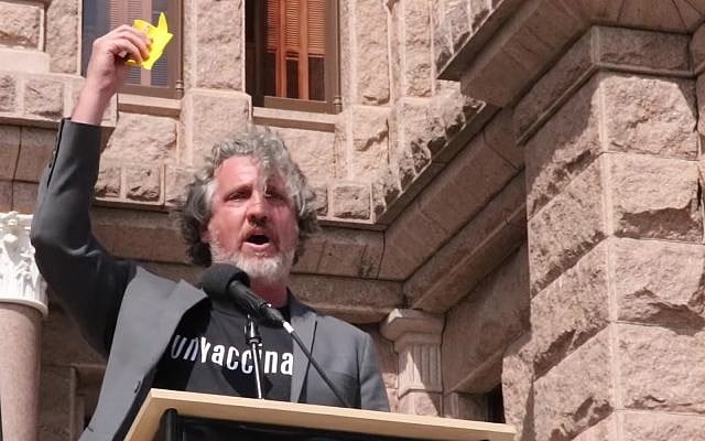Anti-vaccination activist Del Bigtree holds a Star of David at a rally in New York. (YouTube screenshot) Anti-vaccination activist Del Bigtree holds a Star of David at a rally in New York. (YouTube screenshot)
