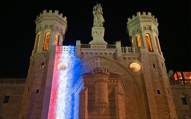 The Notre Dame center in Jerusalem is illuminated with the colors of the French flag in solidarity with Paris, April 18, 2019. (Courtesy/Arnon Bosani) The Notre Dame center in Jerusalem is illuminated with the colors of the French flag in solidarity with Paris, April 18, 2019. (Courtesy/Arnon Bosani)