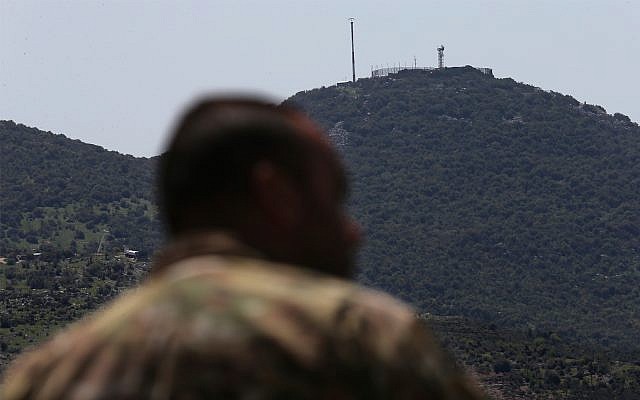 An Israeli military position is seen on a hill over Kfar Chouba, southeast Lebanon. April 9, 2019. (AP Photo/Hussein Malla) An Israeli military position is seen on a hill over Kfar Chouba, southeast Lebanon. April 9, 2019. (AP Photo/Hussein Malla)