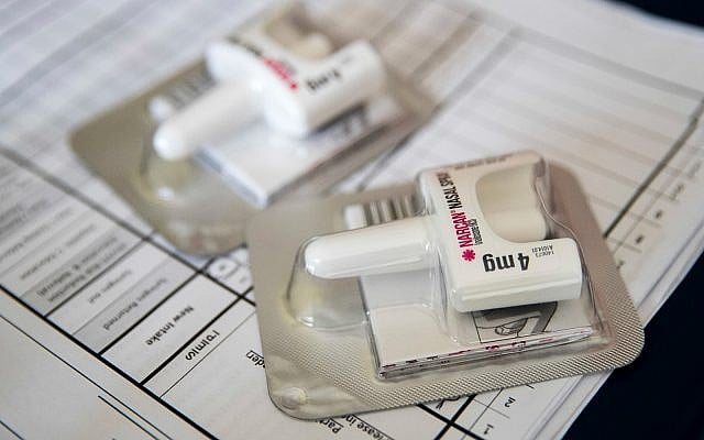 A Narcan nasal device which delivers naloxone lies on a counter as a health educator gives instructions on how to administer it in Brooklyn, New York, July 3, 2018. (AP Photo/Mary Altaffer) A Narcan nasal device which delivers naloxone lies on a counter as a health educator gives instructions on how to administer it in Brooklyn, New York, July 3, 2018. (AP Photo/Mary Altaffer)