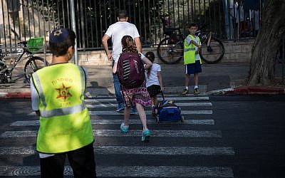 Illustrative: children on their way to school in Jerusalem, September 2, 2018. (Hadas Parush/Flash90)