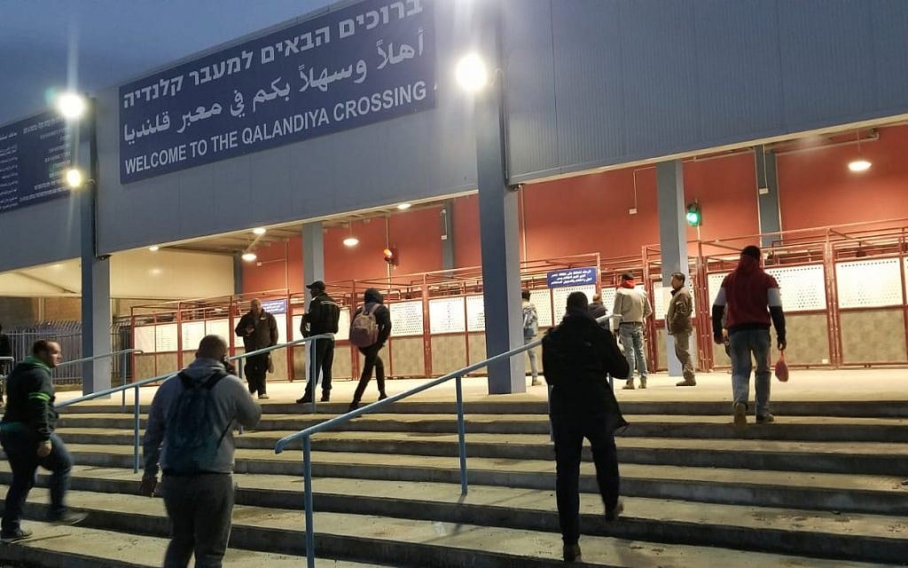 Palestinian workers stream into the Qalandiya checkpoint in northern Jerusalem on April 16, 2019. (Adam Rasgon/Times of Israel) Palestinian workers stream into the Qalandiya checkpoint in northern Jerusalem on April 16, 2019. (Adam Rasgon/Times of Israel)
