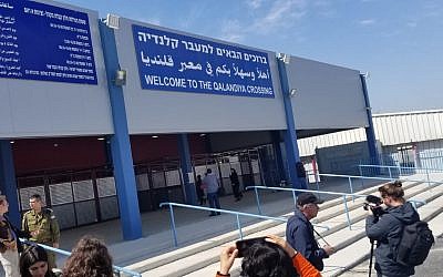 Reporters capturing images of the entrance to the new Qalandiya checkpoint on March 28, 2019. (Adam Rasgon/Times of Israel)