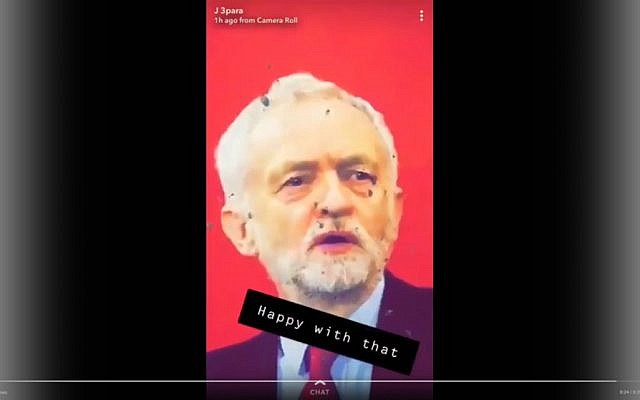 Twitter video screenshot showing bullet holes in poster of UK Labour Party leader Jeremy Corbyn allegedly used by soldiers for target practice. (Twitter screenshot) Twitter video screenshot showing bullet holes in poster of UK Labour Party leader Jeremy Corbyn allegedly used by soldiers for target practice. (Twitter screenshot)