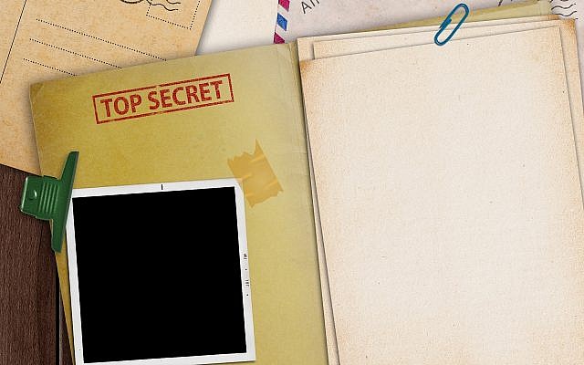 Illustrative - top secret file open on a desk (Getty Images)