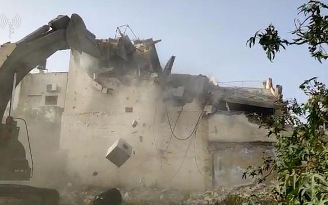 Israeli forces demolish the West Bank home of a Palestinian terrorist who killed a rabbi and an IDF soldier in a shooting spree, April 24, 2019 (IDF Spokesperson's Unit) Israeli forces demolish the West Bank home of a Palestinian terrorist who killed a rabbi and an IDF soldier in a shooting spree, April 24, 2019 (IDF Spokesperson's Unit)