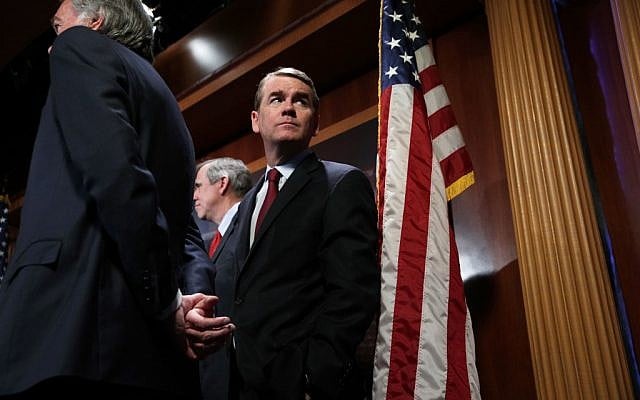In this file photo taken on March 27, 2019, US Senator Michael Bennet listens during a news conference on climate change at the US Capitol in Washington, DC. (ALEX WONG / GETTY IMAGES NORTH AMERICA / AFP) In this file photo taken on March 27, 2019, US Senator Michael Bennet listens during a news conference on climate change at the US Capitol in Washington, DC. (ALEX WONG / GETTY IMAGES NORTH AMERICA / AFP)