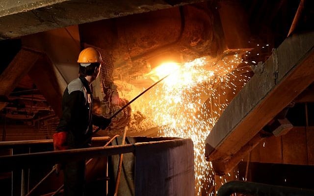 An employee works at the Iran Alloy Steel Company's plant in the central Iranian city of Yazd, on April 6, 2015. (Atta KENARE/ AFP/ File) An employee works at the Iran Alloy Steel Company's plant in the central Iranian city of Yazd, on April 6, 2015. (Atta KENARE/ AFP/ File)